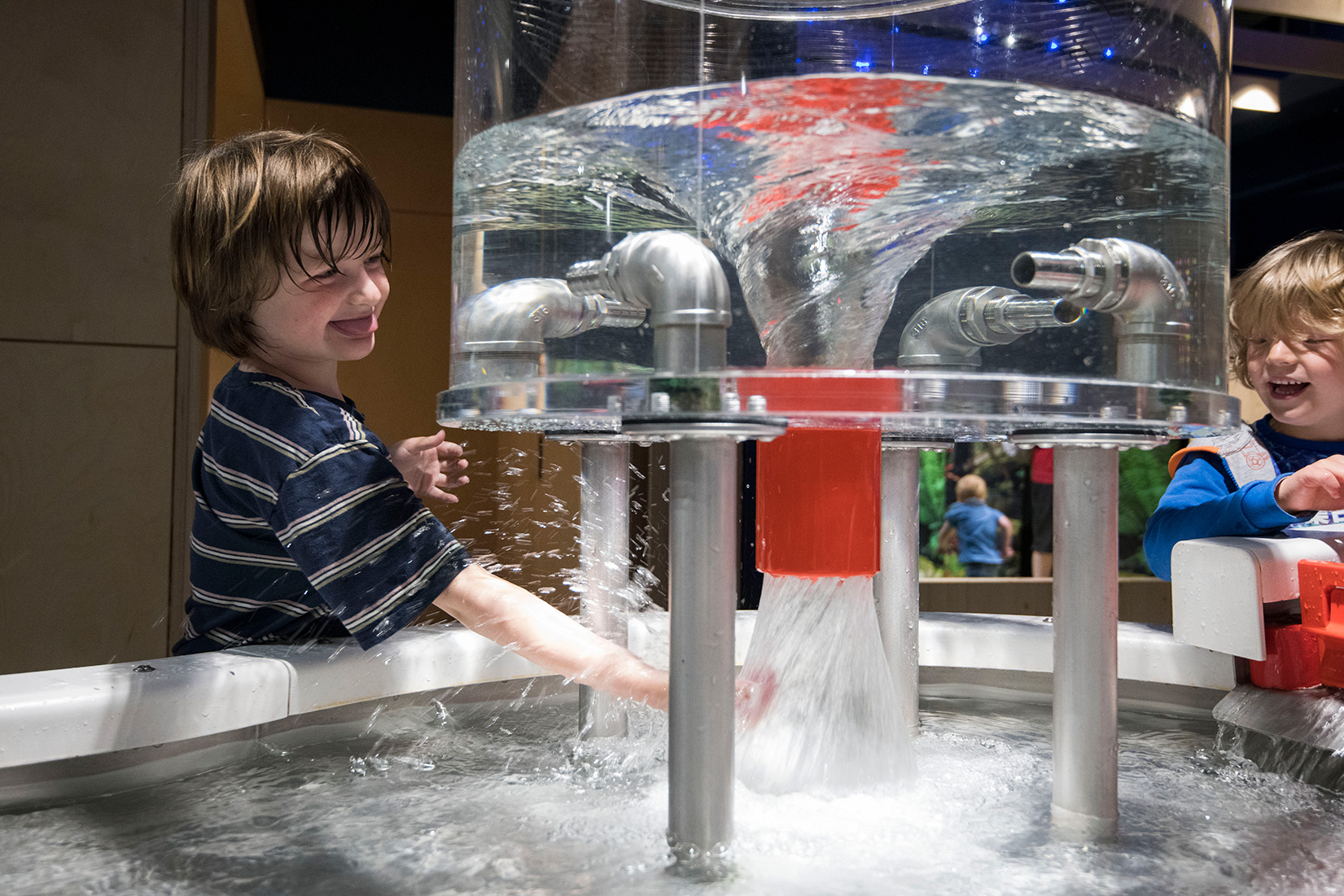 Child playing with Water Table